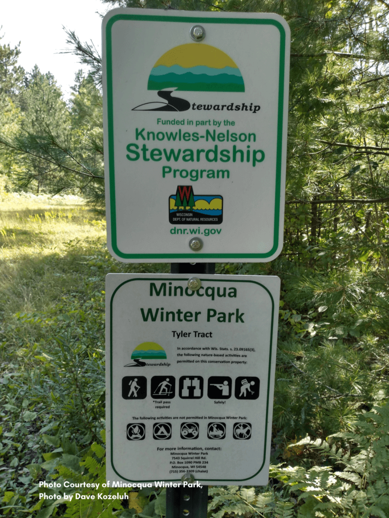 Sign displaying the Knowles-Nelson Stewardship Program logo at Minocqua Winter Park.