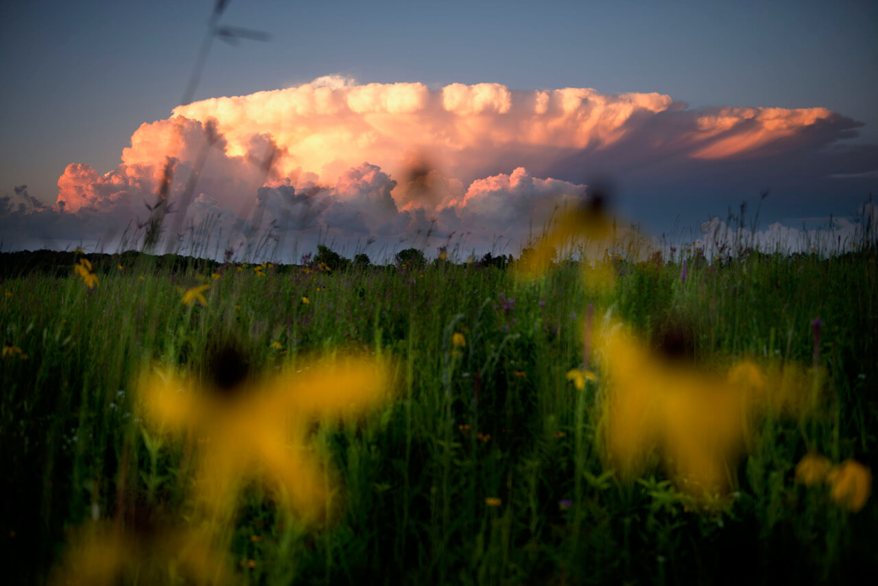 A storm cloud rises above the Englewood Preserve, protected by Standing Cedars Land Conservancy with funding from Wisconsin's Knowles-Nelson Stewardship Program