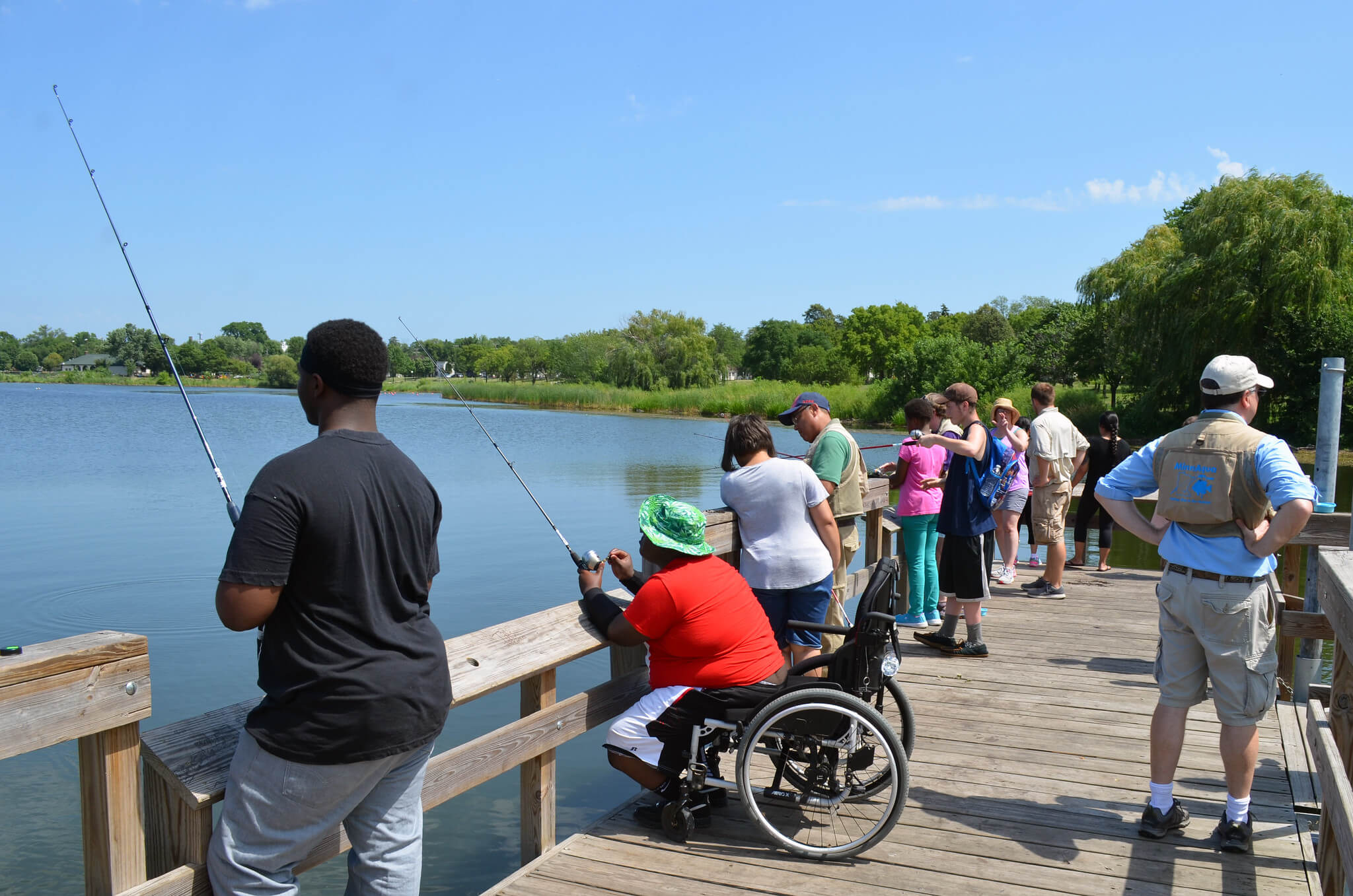 Fishing off a pier. Outdoor recreation increased during the pandemic, and state funding from the Knowles-Nelson Stewardship Program can help increase and maintain outdoor facilities.
