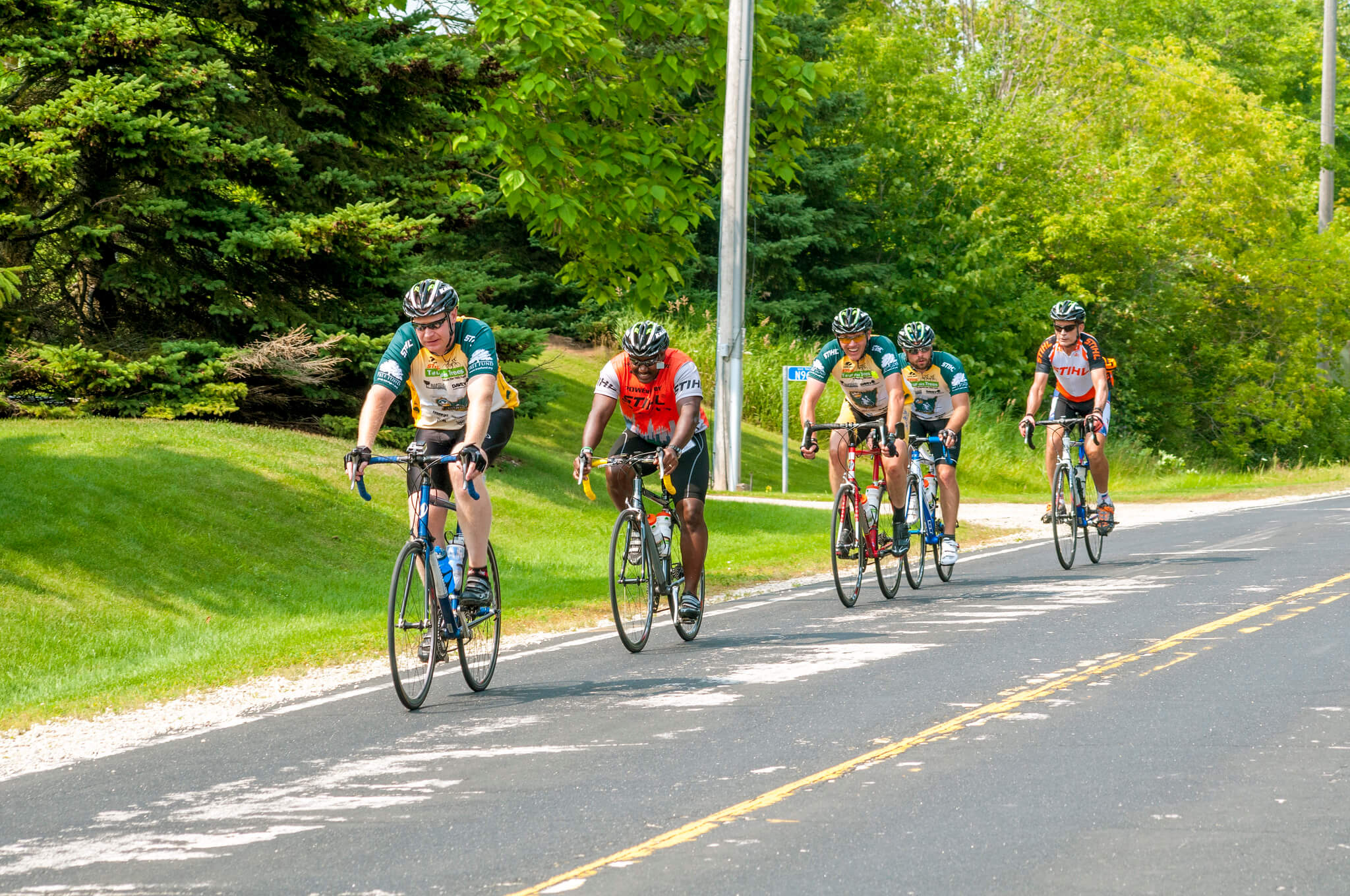 Cyclists on a trail. Vilas County has created many bike trails thanks to Knowles-Nelson.