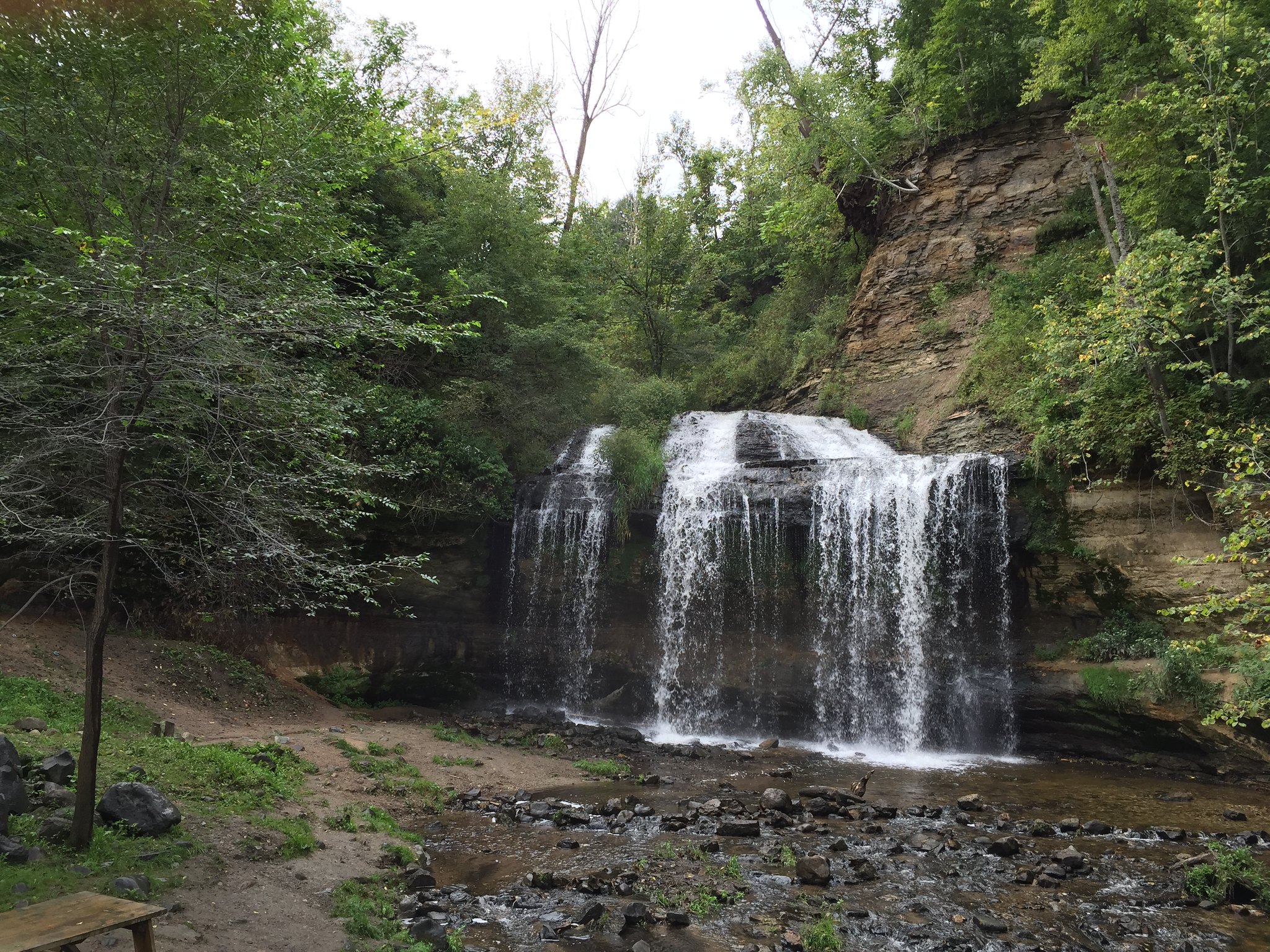 A waterfall cascading down rocks.